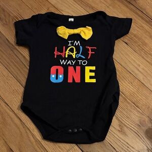 Black "I'm Half Way to One" Baby One-Piece with Yellow Bow